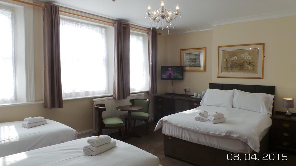 Vernon Guesthouse AEGON International Pokoj fotografie